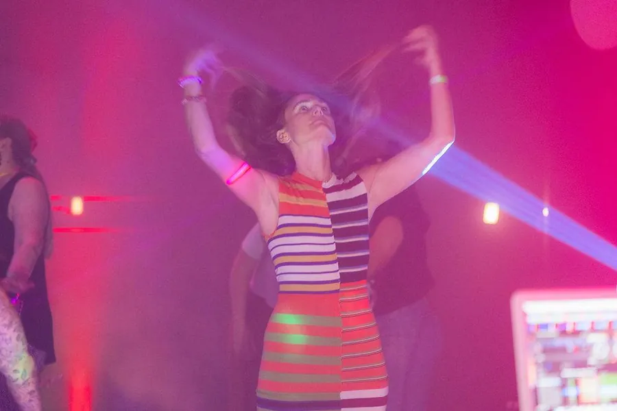 Woman dancing with hair flying