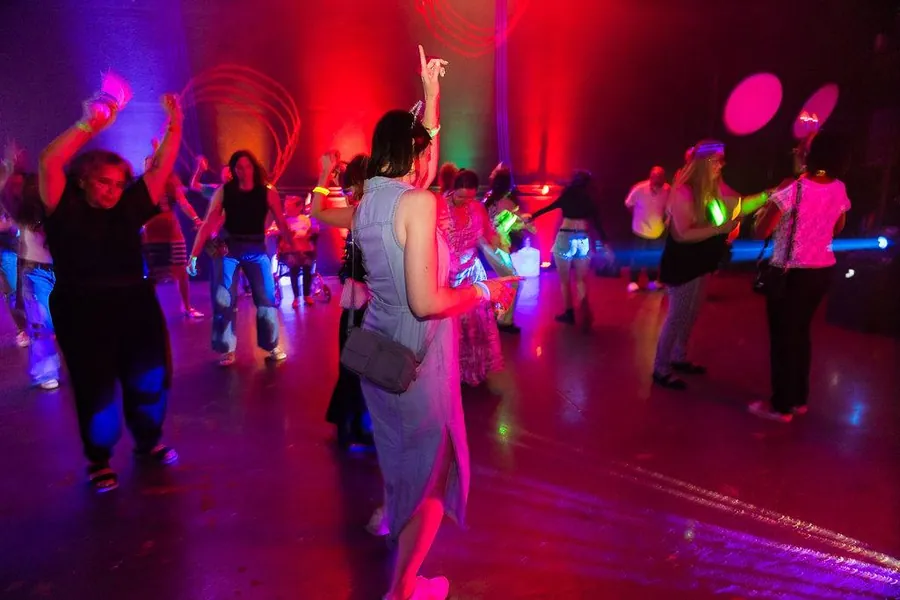 Women in neon rave outfits